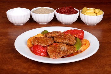 excellent turkish food tray patties on a spicy white plate