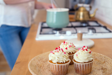 girl making homemade cupcakes , cooking process, kitchen interior