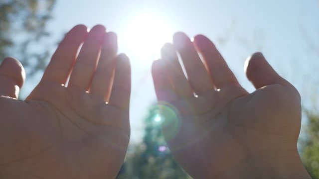 A person raises hands towards the sky and makes a prayer-muslim prayer concept