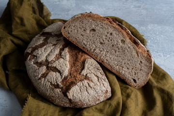 Homemade Freshly Baked Country Bread made from wheat and whole grain flour cut in half