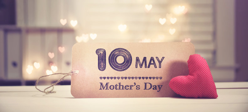 Mother's Day message with a red heart with heart shaped lights