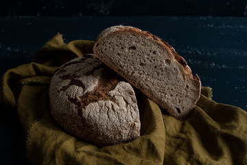 Homemade Freshly Baked Country Bread made from wheat and whole grain flour cut in half