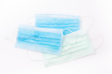 Fototapeta premium Medical mask isolated on white background,Face mask protection against pollution, virus, flu and coronavirus. Health care and surgical concept.