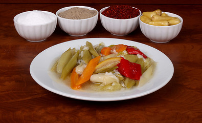 perfect turkish food leek spicy on white plate on wooden table