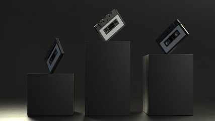 Abstract composition with Retro audio cassettes on black cubes in the center with a depth of field. Vintage cassettes in dark space. 3d render.