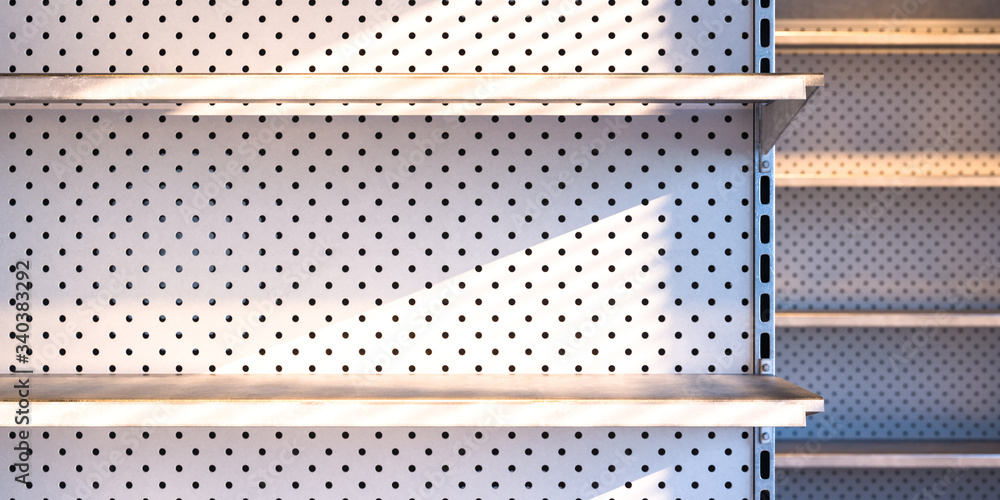 Poster close up of empty shop shelves in store. shop racks with copy space. product store or warehouse. sho