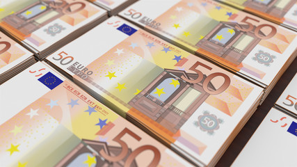 Obraz na płótnie Canvas The stacks of euros banknotes with a depth of field on a wooden background. 3d illustration.