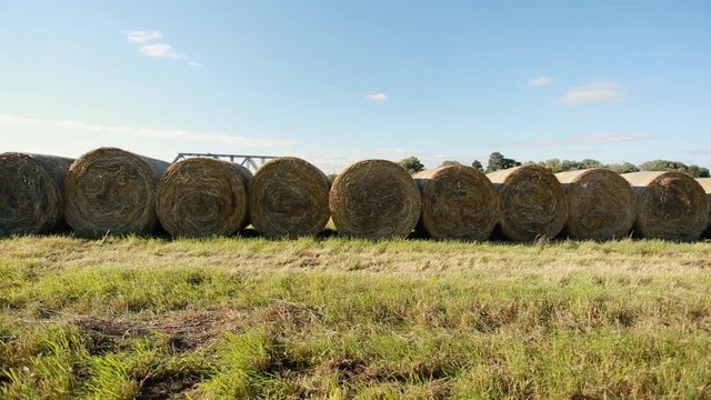 Haystack agriculture field landscape.Agricultural Machinery Handles Haystack.