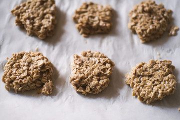 paleo dessert, homemade cookies made of oatmeal and banana . Low carb diet recipes. less sugar consumption. ready to bake cookies.