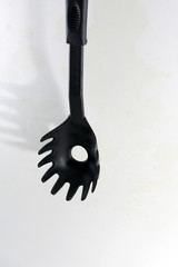 kitchen tool on a white wall