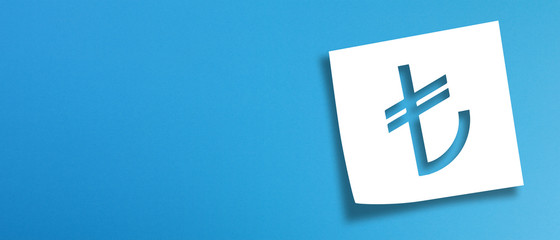 Note paper with turkish lira sign on panoramic blue background