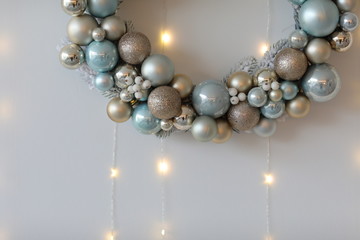 White Christmas background. White Christmas wreath on white background. Copy space. selective focus.