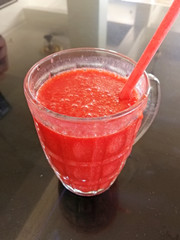 delicious sweet and healthy fresh squeezed watermelon juice in a glass