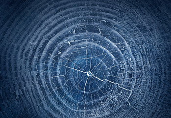 Dark stained blue reclaimed wood surface Rough wooden planks with cracks.