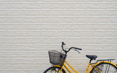 Yellow bicycle Concrete white background