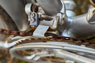 Macro shot of details of a neglected bike that needs urgent maintenance and repair.
