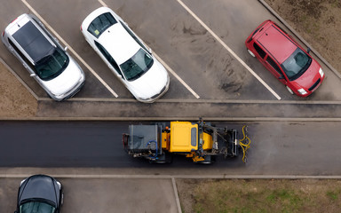 Washing and disinfection of the streets with special machine as a preventive measure against the COVID-19 coronavirus, upside view. Moscow, Russia.