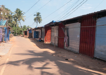 Fototapeta na wymiar The streets of Agonda are empty as village shops are closed and locals as well as tourists stay indoors during the Coronavirus lockdown in South Goa 
