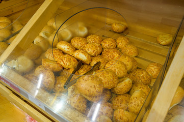 cheese rolls, baked goods on supermarket shelves