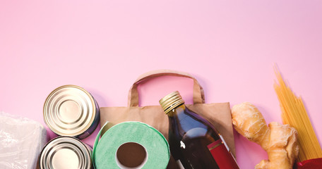 Food set on a pink background top view, selective focus, copy space
