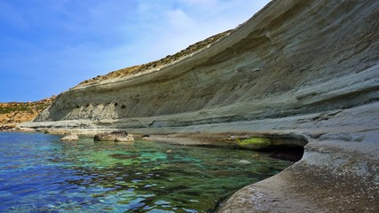 Fototapeta na wymiar Sandstone seaside around Gozo - one of the Maltese Archipelago Islands 