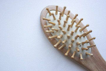 Wooden ecofriendly material natural hearbrush on the white background