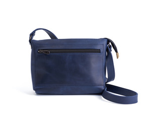 blue leather small handbag with a long handle isolated on a white background