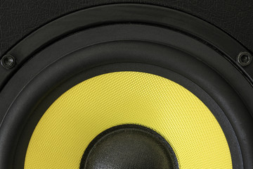 Yellow woofer, black audio enclosure
