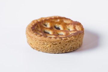 Small apple pie on white background.