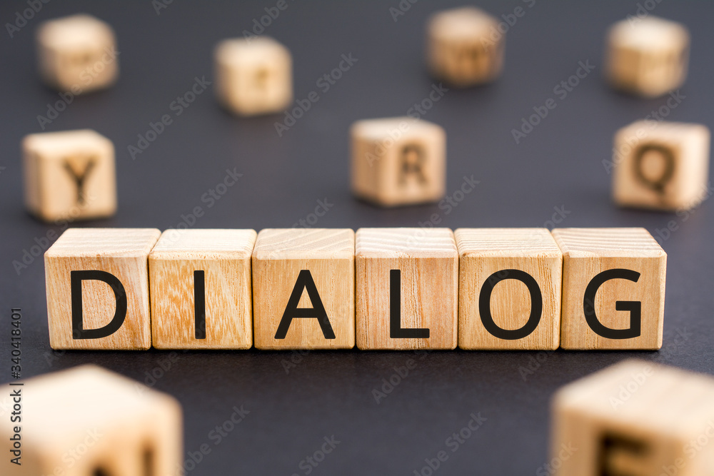 Poster dialog - word from wooden blocks with letters, dialogue interlocution dialog concept, random letters