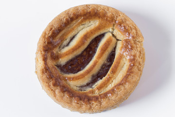 Small apple pie on white background.