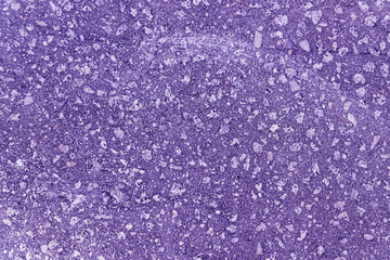 The texture of the paved tile of the street. Concrete paving slabs.