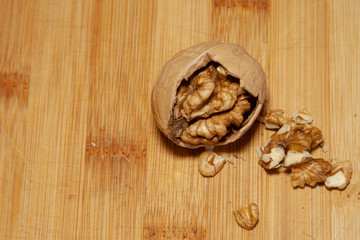 partially split walnut on a light background