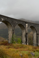 Glenfinnan Railway Viaduct in Scotland with, view from the ground during cloudy day