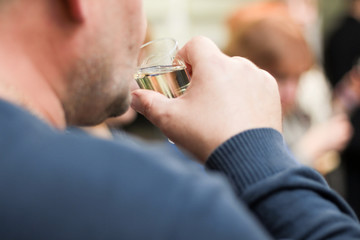 man with a glass of wine
