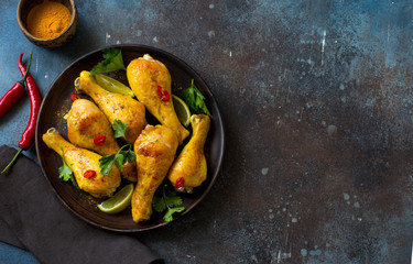 Fried chicken drumsticks with turmeric and hot pepper