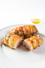 stuffed chicken roll, on white background