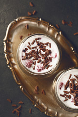Dessert with chocolate shavings, raspberries