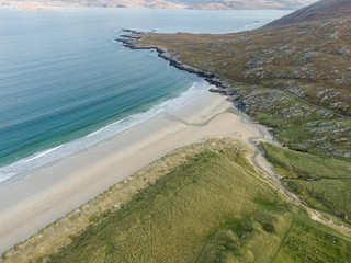 Aerial drone photo of Traigh Rosamol point at Luskentyre beach on the western coast of the Isle of Harris in Scotland. Lovely sunny day.