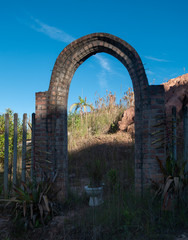 Fototapeta premium Ruins of a stone arch, old entrance