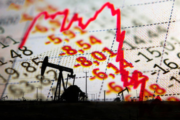 Stock market declining chart and oil pump jack - abstract background