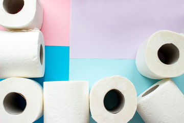 Toilet paper rolls on minimalistic style background. Overhead flat lay format with copy space. Hoarding concept for Coronavirus fear.