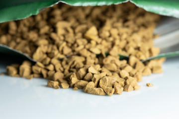 Granulated coffee beans in the coffee package.