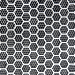 Background metal grilles with hexagonal holes