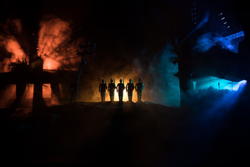 War Concept. Military silhouettes fighting scene on war fog sky background, World War Soldiers...