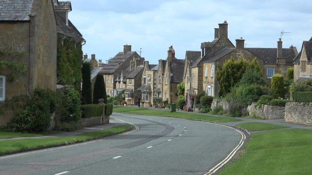Cotswolds traditional english village pretty England UK 4K