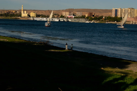 Kids Walking by the Nile in Aswan, Egypt