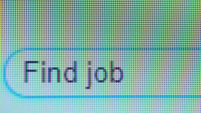 Computer screen displaying search bar with typed Find Job text . Shot in 4k resolution