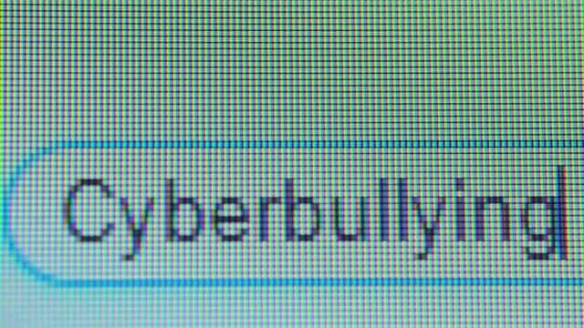 Close up of search bar with typed Cyberbullying word on the computer screen. Shot in 4k resolution