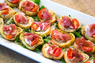 Ham and tomato bruschettas